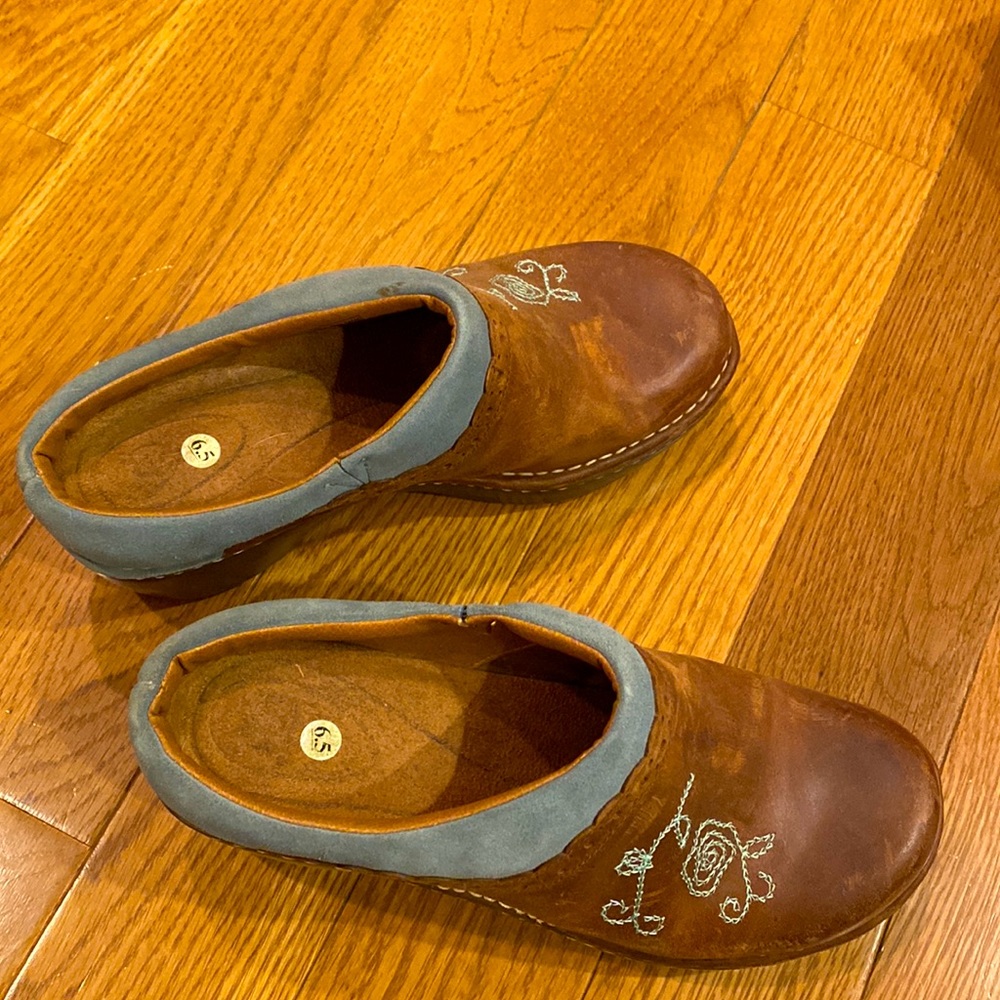 Ariat embroidered leather clogs.